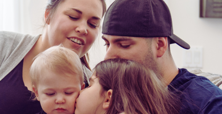 Young family sat together