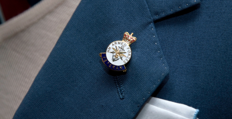 Close up of the Armed Forces veteran pin badge on a lapel