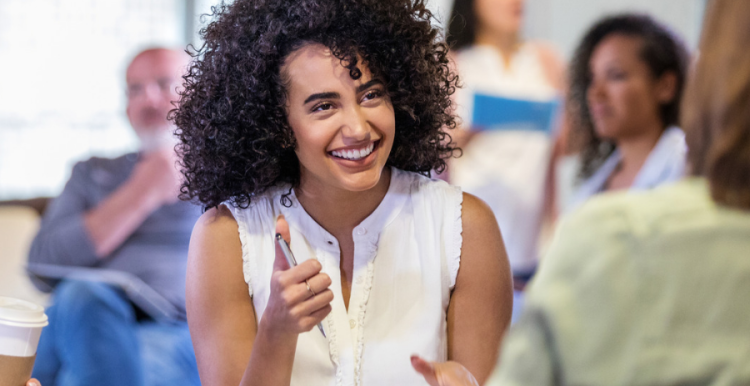 Smiling woman in a meeting