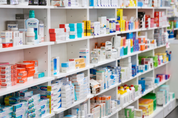 Shelves of medication in a pharmacy